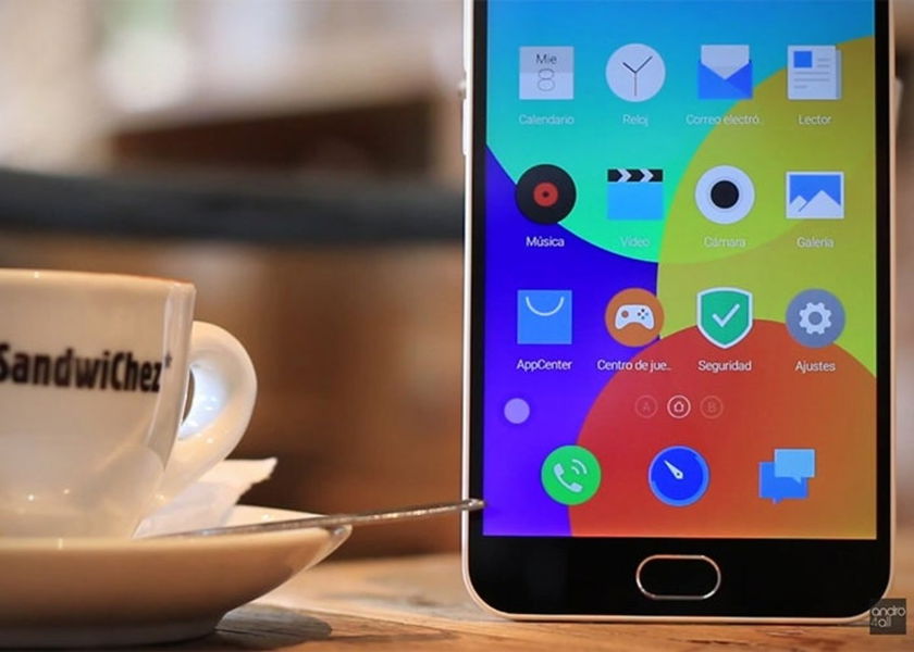 Meizu M2 Note, junto a taza